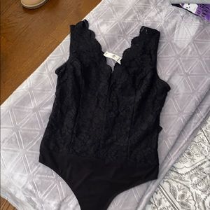 Black lace express body suit Size M